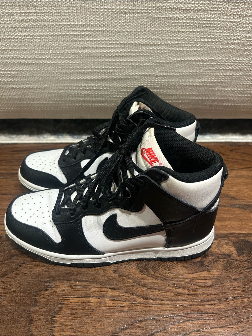 Nike Black and White Mid-Top Sneakers with Red Logo